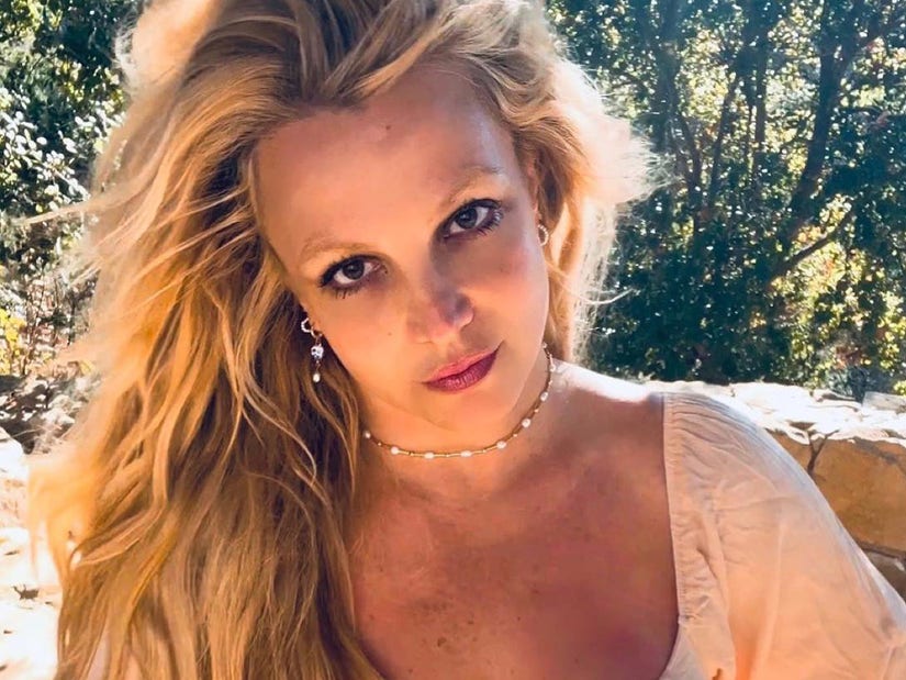 Britney Spears Considered a Boob Job After Weight Loss, Calls Her