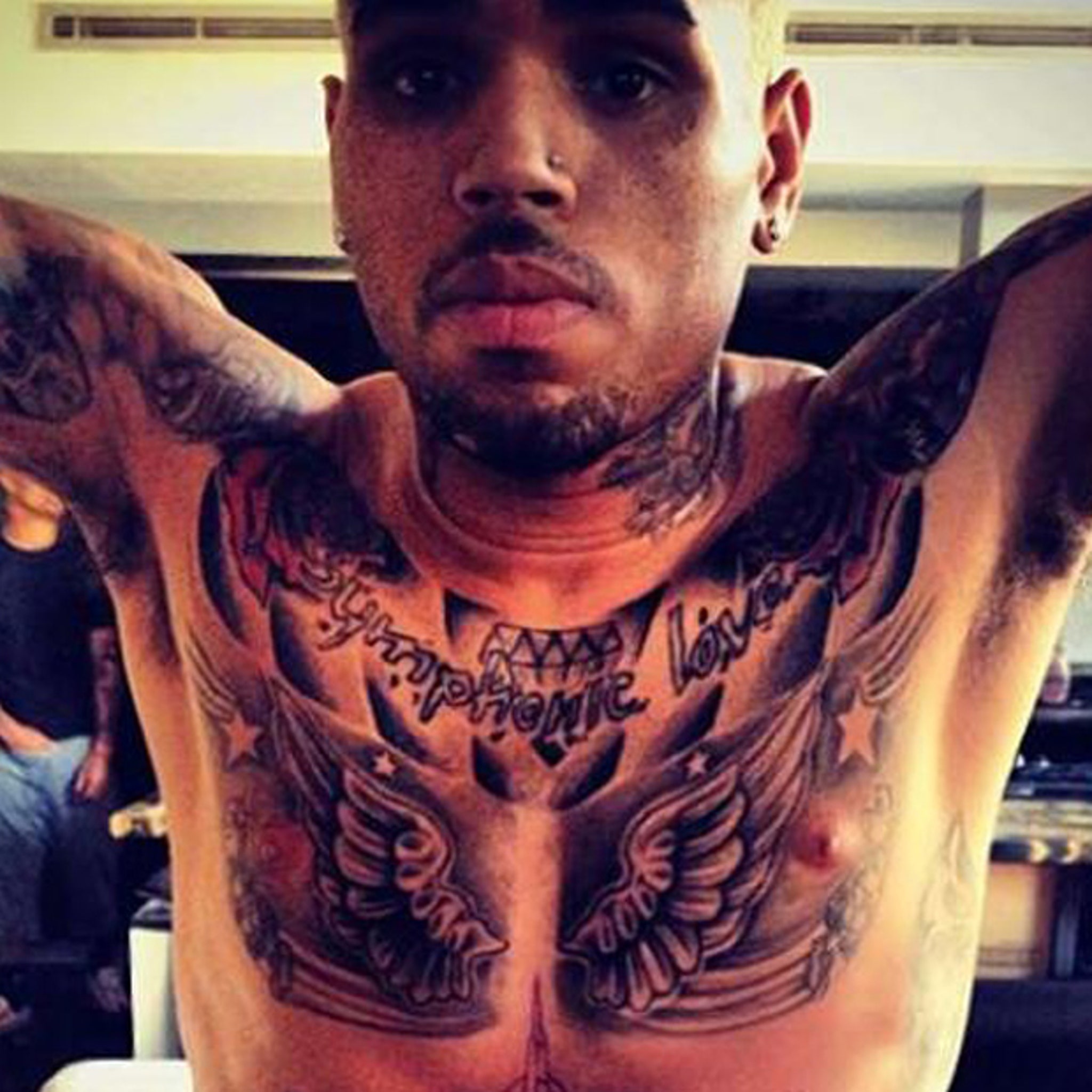 Chris Brown's ” tattoo is a sugar skull (associated with the Mexican  celebration of the Day ) | forbiddenfruitcelebritynews